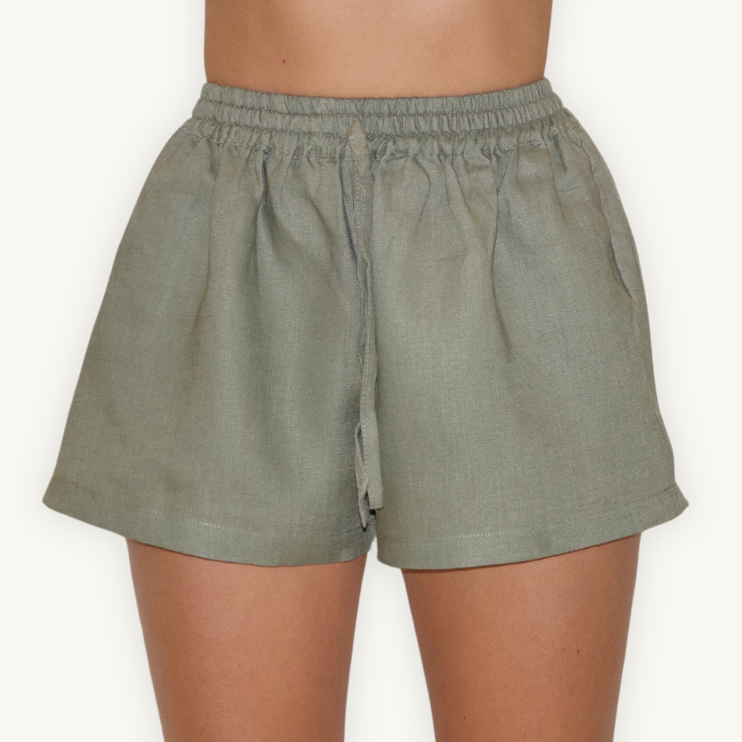 Olive Green 2-inch linen shorts, crafted from lightweight, breathable fabric, ideal for casual and summer wear.