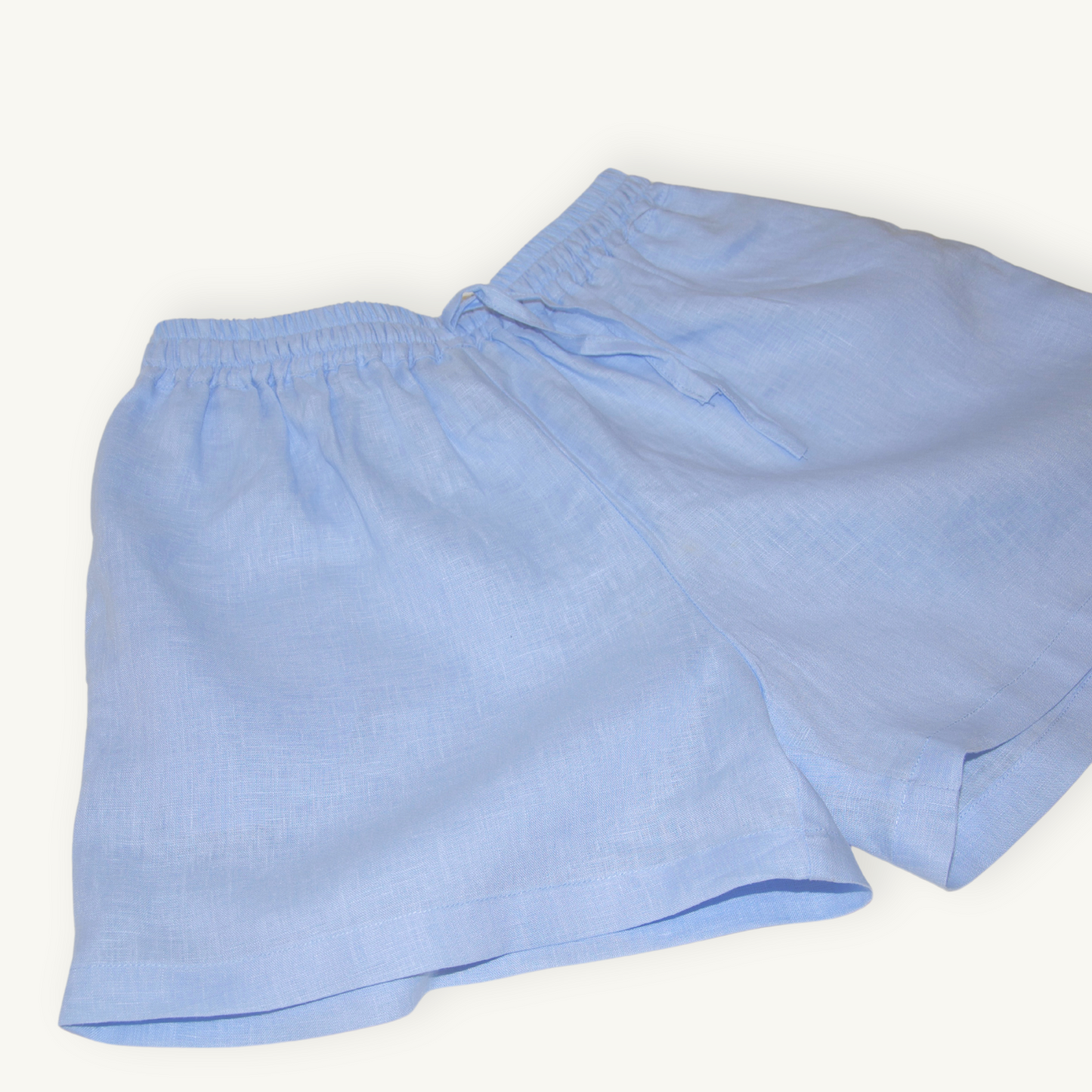 Baby blue 2-inch linen shorts, featuring a breathable and lightweight fabric, perfect for casual summer wear