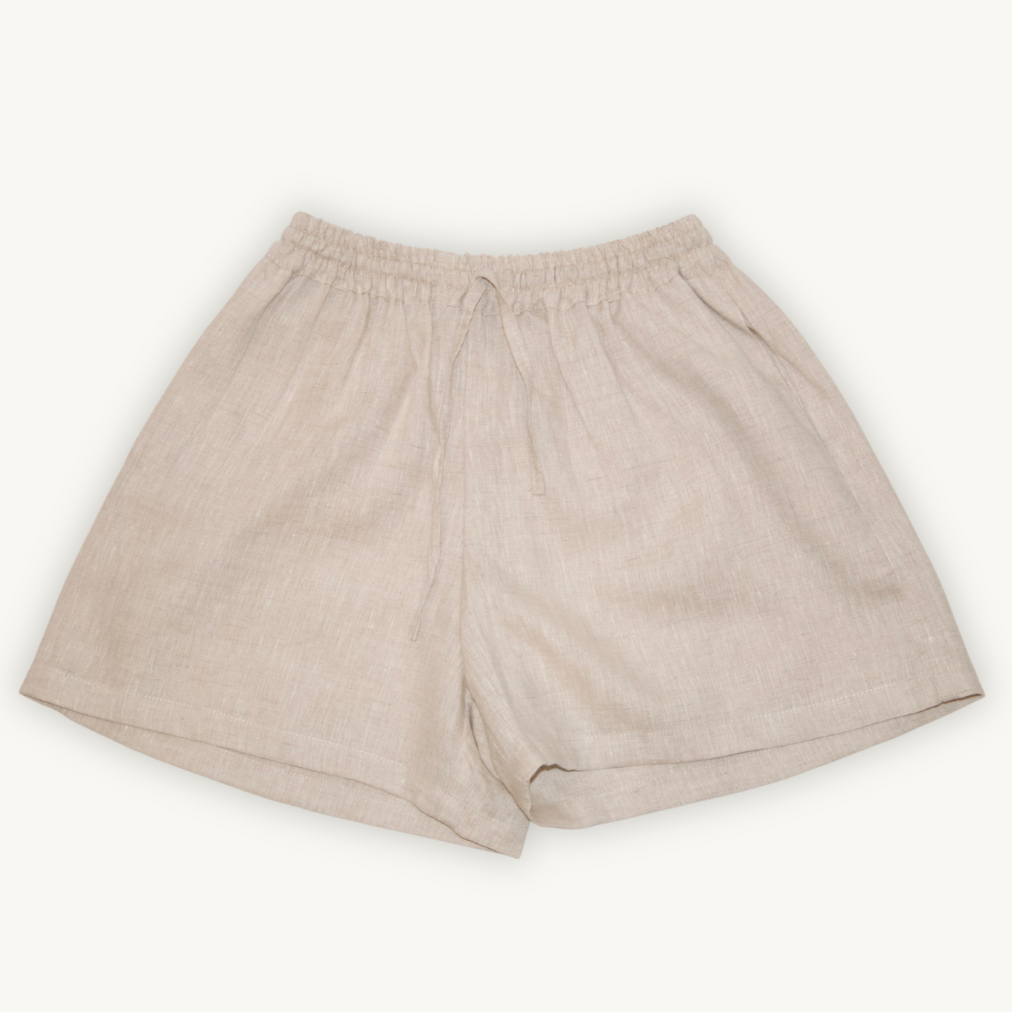 Natural beige 2-inch linen shorts, crafted from lightweight, breathable fabric, ideal for casual and summer wear.