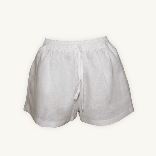 Pure white 2-inch linen shorts, crafted from lightweight, breathable fabric, ideal for casual and summer wear.